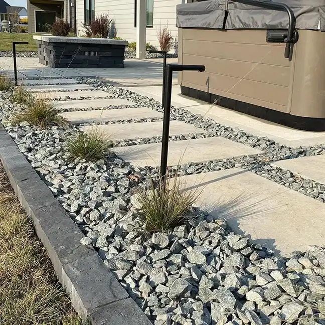 A walkway made up of stone pavers