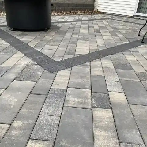 A patterned stone-paved patio area 